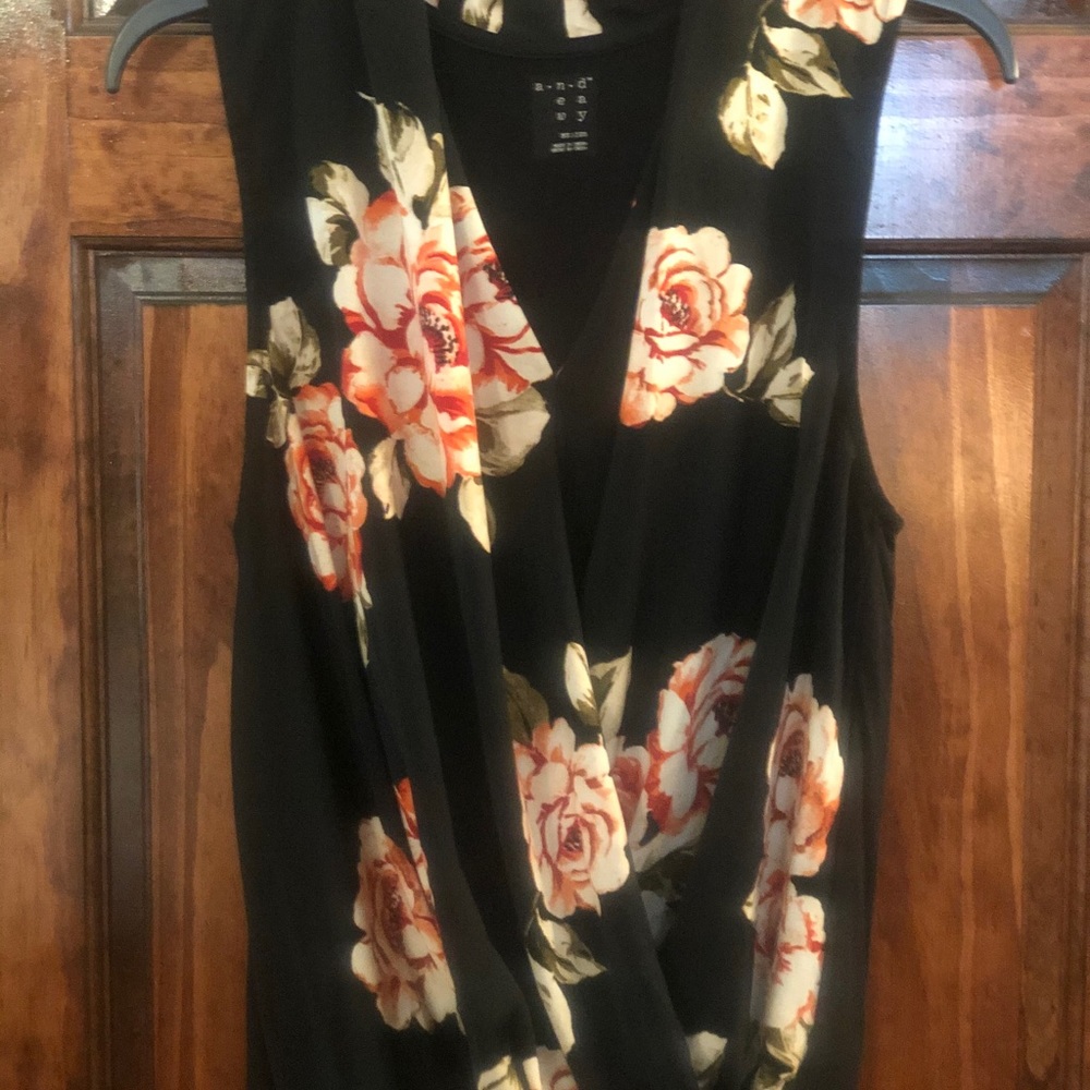 Floral print black sleeveless blouse